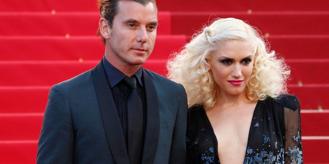 Singer Gwen Stefani (R) and her husband musician Gavin Rossdale.