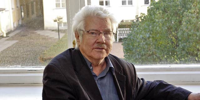 In this photo taken on Sunday, Oct. 9, 2016, prominent Russian journalist Nikolai Andrushchenko poses in St. Petersburg, Russia. 73-year old Andrushchenko, has died of his injuries six weeks after being attacked in St. Petersburg, is reported Wednesday April 19, 2017, by Russian media outlets, citing his lawyer and the editor-in-chief of his newspaper, Novy Peterburg. (AP Photo/Denis Usov)