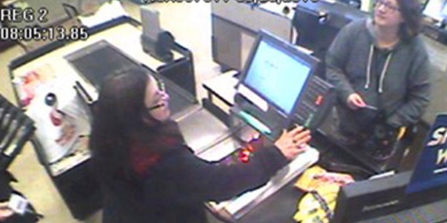 This March 25, 2018, Safeway surveillance photo provided by the California Highway Patrol shows Jennifer Hart, right, at a Safeway store in Fort Bragg, Calif.
