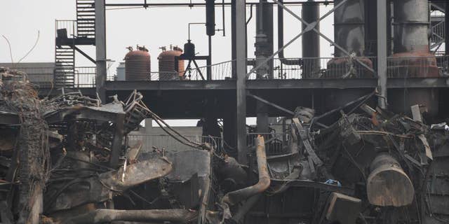This photo released by China's Xinhua News Agency, shows a chemical factory after an explosion in Lijin county, east China's Shandong province Wednesday, Sept. 2, 2015. The factory that produces adhesive materials exploded on Monday night and the cause of the blast is still under investigation. (Lou Chen/Xinhua via AP) NO SALES