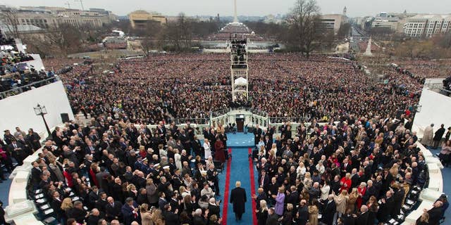 FILE - In this Jan. 20, 2017 file photo, President-elect Donald Trump arrives during the 58th Presidential Inauguration at the U.S. Capitol in Washington. Venezuela President Nicolas Maduro's administration made a $500,000 donation to Donald Trump’s inauguration. Inaugural committee records filed with the Federal Election Commission show Citgo Petroleum, a U.S. affiliate of Venezuela’s state oil company PDVSA, was one of the biggest corporate donors to events surrounding the swearing-in ceremony. (AP Photo/Carolyn Kaster, File)
