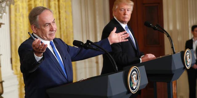 In this Wednesday, Feb. 15, 2017 file photo, President Donald Trump and Israeli Prime Minister Benjamin Netanyahu give a joint news conference in the East Room of the White House in Washington. The debate among American Jews over President Donald Trump has become as raucous as the first weeks of the Trump administration itself, hardening divisions between liberal and conservative Jews that have been growing for years. (AP Photo/Pablo Martinez Monsivais)