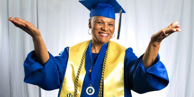 In this undated photo provided by Tennessee State University, Darlene Mullins poses at the university in Nashville, Tenn.  Fifty-five years after she cut short her college education when she fell in love, Mullins has finally graduated. Tennessee State University says Mullins, a 72-year-old grandmother of four, participated in the school's undergraduate commencement ceremony Saturday, May 6, 2017.  (Tennessee State University via AP)