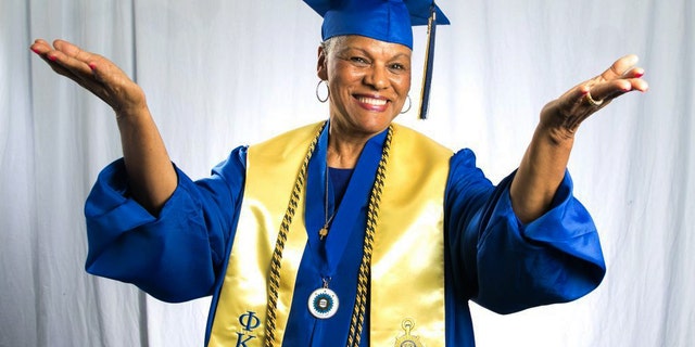In this undated photo provided by Tennessee State University, Darlene Mullins poses at the university in Nashville, Tenn. Fifty-five years after she cut short her college education when she fell in love, Mullins has finally graduated. Tennessee State University says Mullins, a 72-year-old grandmother of four, participated in the school's undergraduate commencement ceremony Saturday, May 6, 2017. (Tennessee State University via AP)