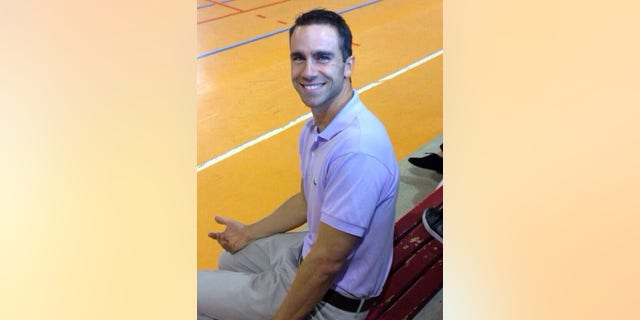 This undated photo provided by Omaima ElFaitori shows Ronald Thomas Smith II. Smith, an American chemistry teacher, was shot to death as he was jogging in Benghazi on Thursday, Dec. 5, 2013. (AP Photo/Omaima ElFaitori)