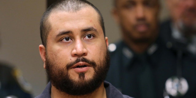 SANFORD, FL - NOVEMBER 19: George Zimmerman the acquitted shooter in the death of Trayvon Martin, answers questions from a Seminole circuit judge during a first-appearance hearing on charges including aggravated assault stemming from a fight with his girlfriend November 19, 2013 in Sanford, Florida. Zimmerman, 30, was arrested after police responded to a domestic disturbance call at a house. He was acquitted in July of all charges in the shooting death of unarmed, black teenager, Trayvon Martin. (Photo by Joe Burbank-Pool/Getty Images)