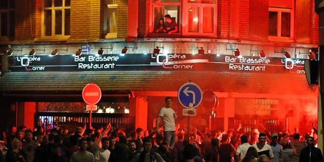 England supporters gather outside a bar in downtown Lille, France Wednesday, June 15, 2016 one day ahead of the Euro 2016 Group B soccer match against Wales in nearby Lens.