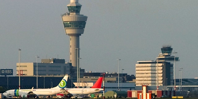 Two men from the Detroit area suspected of terrorist activity were arrested at Amsterdam's airport, shown in this April 2010 file photo.