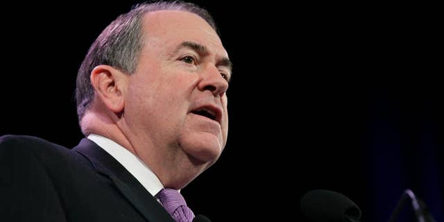 FILE - In this Saturday, Jan. 24, 2015, file photo, former Arkansas Gov. Mike Huckabee speaks during the Freedom Summit, in Des Moines, Iowa. Huckabee says gay marriage is akin to alcohol and profanity _ options the Republican weighing a 2016 presidential bid says are appealing to others, but not to him. (AP Photo/Charlie Neibergall, File)