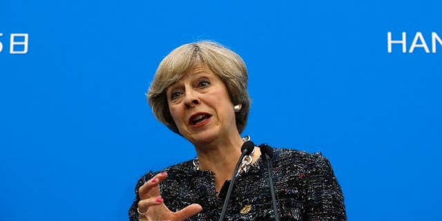 FILE - In this Monday, Sept. 5, 2016 file photo, British Prime Minister Theresa May speaks at a press conference held at the end of the G-20 summit in Hangzhou in eastern China's Zhejiang province. Since the U.K. voted to leave the European Union, Prime Minister Theresa May has said it again and again: Brexit means Brexit.Despite the mantra, it's far from clear what a British exit from the bloc will look like. Almost three months after the vote, Britons and Europeans still don’t know when the departure will happen and how it will affect their work, travel, pocketbooks and prospects.(AP Photo/Ng Han Guan, file)