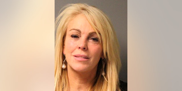 Dina Lohan is pictured in this undated booking photo courtesy of the New York State Police. Lohan, the mother of troubled actress Lindsay Lohan, was arrested and charged with drunken driving on the night of September 12, 2013, after she was stopped for speeding in New York, police said.