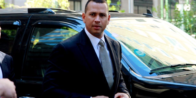 FILE- In this Oct. 1, 2013, file photo, New York Yankees' Alex Rodriguez arrives at the offices of Major League Baseball for grievance hearing in New York. Rodriguez allegeldy paid $305,000 for evidence that could be used in the case involving the Biogenesis of America drug clinic, the Daily News reported Saturday, Oct. 19, 2013. The allegation was denied by a spokesman for the Yankees' third baseman. Rodriguez was suspended Aug. 5 but was allowed to keep playing pending a decision on the grievance. (AP Photo/David Karp, File)