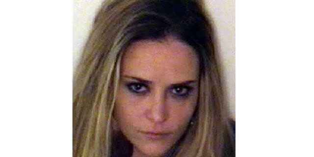 This undated photo provided by the Aspen Police Department shows Brooke Mueller.