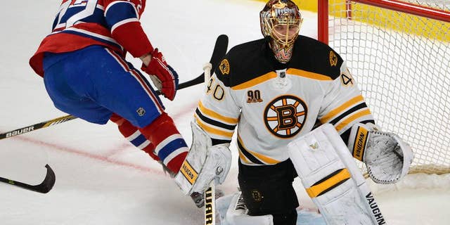 Montreal Canadiens right wing Dale Weise (22) scores the third goal against Boston Bruins goalie Tuukka Rask (40) during second period in Game 3 of an NHL hockey Stanley Cup playoff series, Tuesday, May 6, 2014, in Montreal. (AP Photo/The Canadian Press, Ryan Remiorz)