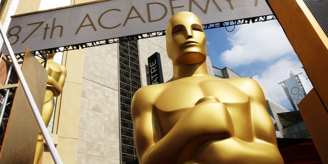 An Oscar statue is seen as preparations are made for the 87th Academy Awards in Los Angeles, Saturday, Feb. 21, 2015. The Academy Awards will be held at the Dolby Theatre on Sunday, Feb. 22. (Photo by Matt Sayles/Invision/AP)