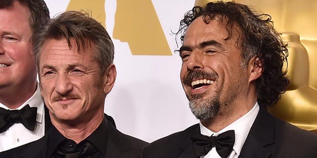 James W. Skotchdopole, from left, Sean Penn, Alejandro Gonzalez Inarritu and John Lesher pose in the press room with the awards for best picture and best director for âBirdman" at the Oscars on Sunday, Feb. 22, 2015, at the Dolby Theatre in Los Angeles. (Photo by Jordan Strauss/Invision/AP)
