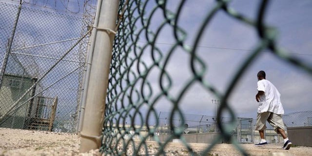 FILE: April 27, 2010: A Guantanamo detainee exercising inside the detention facility, at Guantanamo Bay U.S. Naval Base, Cuba.