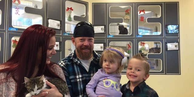 The Tipton family, from left: Simone, Matt, Scarlette and Cayden. And, of course, Holly the kitten.