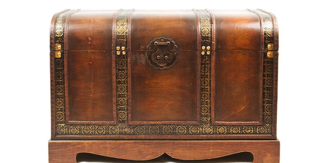 Antique wooden trunk isolated on white