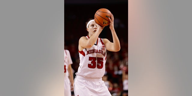 FILE - In this Nov. 27, 2013 file photo, Nebraska's Jordan Hooper shoots in an NCAA college basketball game against UMass-Lowell in Lincoln, Neb. Hooper is on the verge scoring her 2,000th career point for 18th-ranked Nebraska. If she scores 10 points against Minnesota on Thursday, Jan. 16, 2014, she'll become the fourth player in program history to achieve the milestone. (AP Photo/Nati Harnik, File)