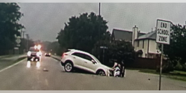 Flash flood warnings were in effect over the weekend in the Dallas-Fort Worth area. In this photo an SUV was swept off the road in Arlington, Texas.