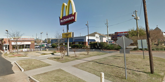 A man was killed and four others were wounded after shots were fired at a McDonald's near Auburn University, police said.