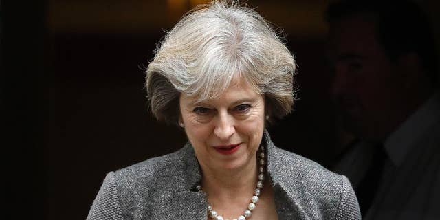 Britain's Prime Minister Theresa May leaves 10 Downing Street in London, Monday, Sept. 26, 2016. (AP Photo/Frank Augstein)