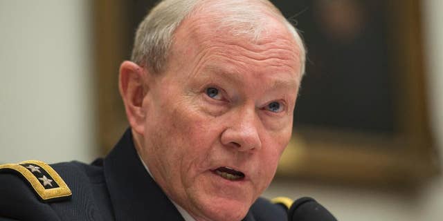 FILE - In this March 18, 2015, file photo, Joint Chiefs Chairman Gen. Martin Dempsey testifies on Capitol Hill in Washington. In the homestretch of a 41-year U.S. Army career shaped by war and the scars from it, Dempsey does not hide his skepticism that Iraq will find its own path to lasting victory over the Islamic State group. But neither does he say the threats to Iraq today justify sending American ground troops back into combat. He counsels patience, for now. (AP Photo/Molly Riley, File)