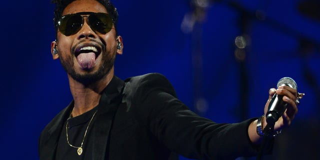 LAS VEGAS, NV - SEPTEMBER 21: Singer Miguel performs during the iHeartRadio Music Festival at the MGM Grand Garden Arena on September 21, 2013 in Las Vegas, Nevada. (Photo by Ethan Miller/Getty Images for Clear Channel)