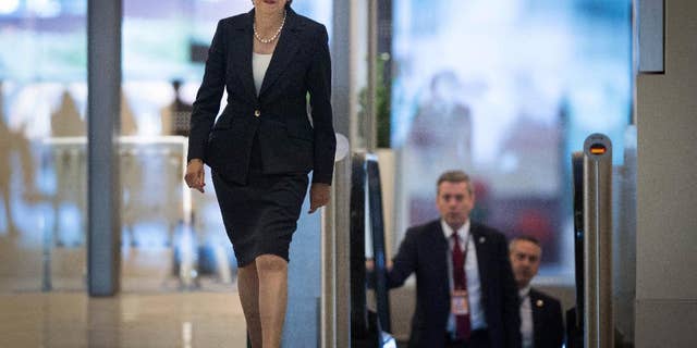 Britain's Prime Minister Theresa May arrives ahead of a TV interview at BBC studios in Birmingham, England, before the start of the annual Conservative party conference, Sunday Oct. 2, 2016. During the interview May said Britain will trigger the Article 50 formal process for leaving the European Union, Brexit, before the end of March 2017, setting the nation on a course to leave the 28-nation European trading bloc by 2019. (Stefan Rousseau / PA via AP)