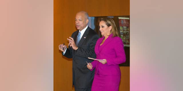 U.S. Homeland Security Secretary Jeh Johnson, left, talks to Mexico's Foreign Affairs Minister Claudia Ruiz Massieu, in Mexico City, Tuesday, Oct. 11, 2016. Johnson said during his visit to Mexico City, some flights to Haiti have been suspended due to Hurricane Matthew. He said Tuesday that U.S. officials will have to "be sympathetic to the plight of the people of Haiti as a result." But after conditions change, "we intend to resume the policy." (AP Photo/Eduardo Verdugo) (AP Photo/Eduardo Verdugo)