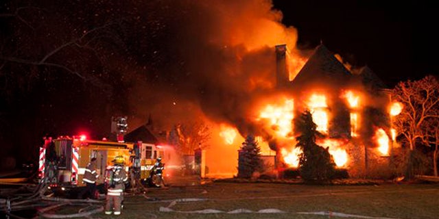 Jan. 19, 2015: In this file photo, firefighters battle a four-alarm fire at a home in Annapolis, Md.