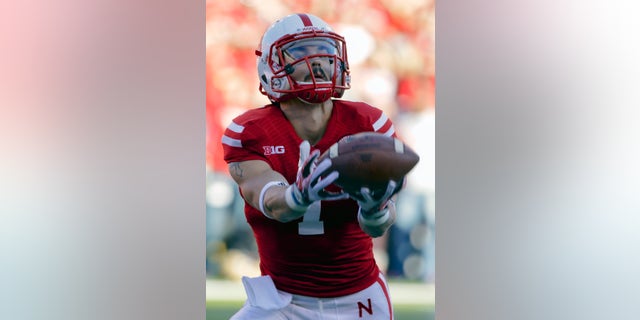Nebraska wide receiver Jordan Westerkamp (1) fumbles a kickoff ball for a turnover in the first half of an NCAA college football game against Michigan State in Lincoln, Neb., Saturday, Nov. 16, 2013. (AP Photo/Nati Harnik)