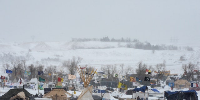 The Oceti Sakowin camp is seen in a snow storm during a protest against plans to pass the Dakota Access pipeline near the Standing Rock Indian Reservation, near Cannon Ball, North Dakota, U.S. November 29, 2016.