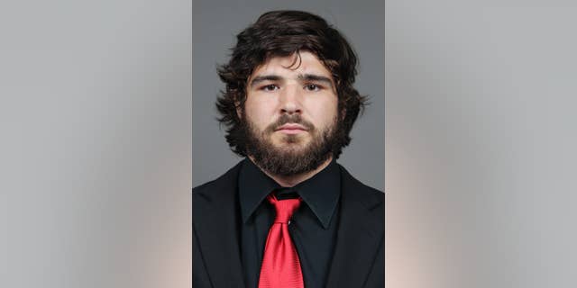 This photo taken on Wednesday, Sept. 11, 2013, and provided by Ohio State university shows college football player Kosta Karageorge in Columbus, Ohio. The mother of a missing Ohio State football player has told police he texted her about his prior concussions the morning he disappeared. A missing-person report filed with Columbus police Wednesday evening, Nov. 26, 2014, says Karageorge told his mother he was sorry if he was an embarrassment but concussions had his head messed up. The 6-foot-5 senior missed practice Wednesday and Thursday and has not been heard from. (AP Photo/Ohio State University, Jay LaPrete)