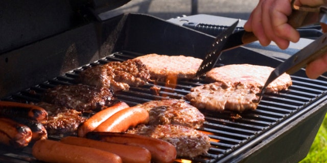 Flipping Burgers on a grill