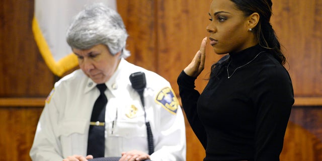 Shayanna Jenkins sworn in during Aaron Hernandez's murder trial, Friday, March 27, 2015, in Fall River, Mass.
