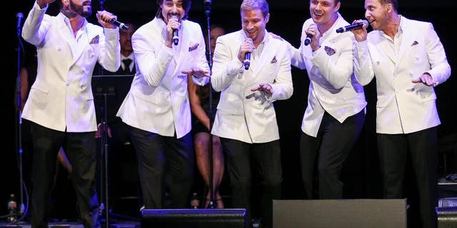 FILE - In this May 19, 2016 file photo, A.J. McLean, from left, Kevin Richardson, Brian Littrell, Nick Carter and Howie Dorough of the Backstreet Boys perform at the 12th Annual MusiCares MAP Fund Benefit Concert held at The Novo by Microsoft, in Los Angeles. Backstreet will be back - and back and back and back _ in Las Vegas. The pop group Backstreet Boys confirmed reports Friday, Sept. 23, 2016, they will begin a Planet Hollywood residency next year. (Photo by John Salangsang/Invision/AP, File)