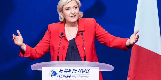 Far-right candidate for the presidential election Marine Le Pen speaks during a campaign meeting in Paris, France, Monday, April 17, 2017. As France's unpredictable presidential campaign nears its finish with no clear front-runner, centrist candidate Emmanuel Macron and far-right leader Marine Le Pen hope to rally big crowds in Paris with their rival visions for Europe's future. (AP Photo/Kamil Zihnioglu)