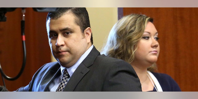 SANFORD, FL - JUNE 24: George Zimmerman arrives with his wife Shellie, on the 11th day of his trial in Seminole circuit court June 24, 2013 in Sanford, Florida. Today prosecutors began with their opening statements. Zimmerman is charged with second-degree murder for the February 2012 shooting death of 17-year-old Trayvon Martin. (Photo by Joe Burbank-Pool/Getty Images)