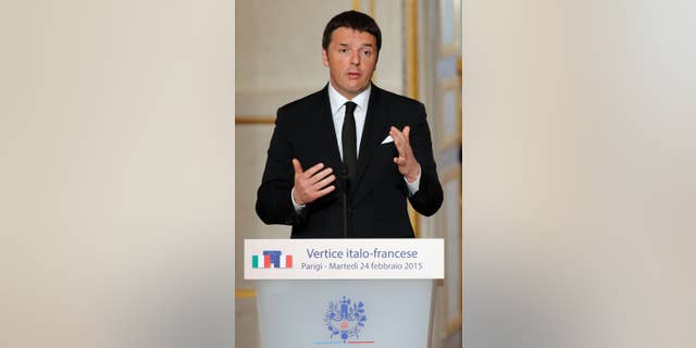 Italian Premier Matteo Renzi delivers his speech during a joint press conference with French President Francois Hollande ending the Franco-Italian summit at the Elysee Palace in Paris, France, Tuesday, Feb. 24, 2015. (AP Photo/Francois Mori, pool)