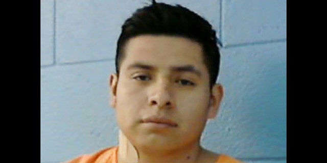This undated photo provided by the Fayette County Sheriff's Office shows Miguel Mejia-Ramos, who was captured early Tuesday, Jan. 21, 2014, at a vehicle roadblock in Schulenburg, Texas, located between Houston and San Antonio. Police say Mejia-Ramos is considered a suspect in the fatal stabbings of his two young daughters and wife in the Queens borough of New York. (AP Photo/Fayette County Sheriff's Office)