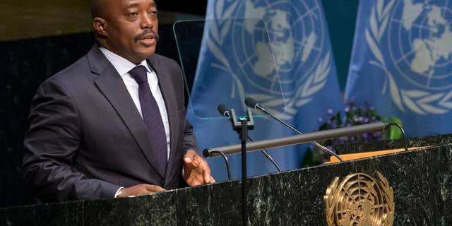 FILE - In this file photo dated Friday, April 22, 2016, Congolese President Joseph Kabila speaks Friday, April 22, 2016 at U.N. headquarters. Longtime incumbent Kabila is constitutionally barred from seeking another term in office, but Congo's top opposition candidate for the upcoming presidential election Moise Katumbi flew to South Africa for medical treatment Friday May, 20, 2016, one day after authorities issued an arrest warrant for him. (AP Photo/Mary Altaffer, FILE)