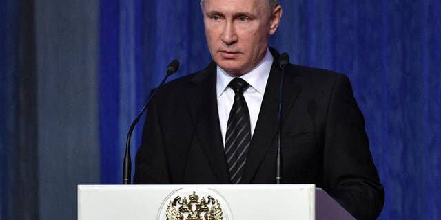 Russian President Vladimir Putin speaks at an annual meeting marking a professional holiday for Russian security service employees in Moscow, Russia, Tuesday, Dec. 20, 2016. (Alexei Nikolsky, Sputnik, Kremlin Pool Photo via AP)