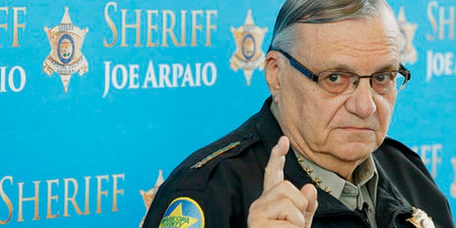 FILE - In this Dec. 18, 2013, file photo, Maricopa County Sheriff Joe Arpaio speaks at a news conference at the Sheriff's headquarters in Phoenix, Ariz. The sheriff of metropolitan Phoenix has raised close to $10 million in his bid for a seventh term, a stunning collection of campaign riches for a local police race. Much of the money contributed to Arpaio was donated by a devoted base of backers who live outside Arizona. (AP Photo/Ross D. Franklin, File)