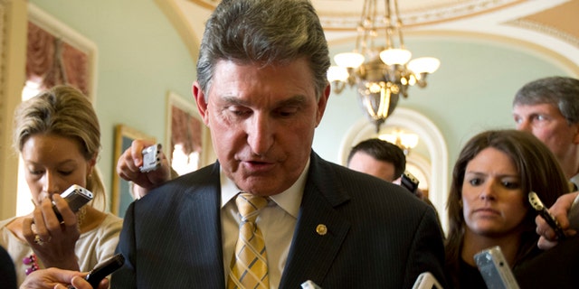 FILE: April 9, 2013: Sen. Joe Manchin, D-W.Va., on Capitol Hill, in Washington, D.C.