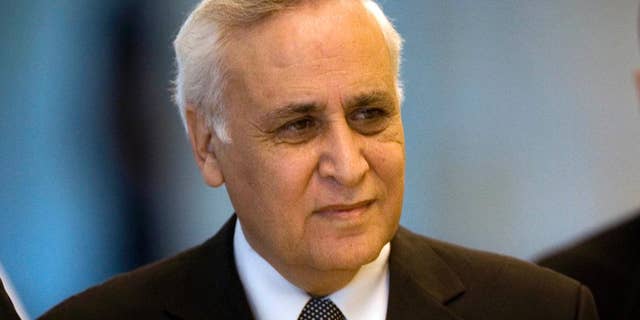 FILE - In this Nov. 10, 2011 file photo, Former Israeli President Moshe Katsav arrives at the Supreme court, in Jerusalem. Katsav was released from prison after serving 5 years for rape conviction, Wednesday, Dec.21, 2016. (AP Photo/Sebastian Scheiner, File)