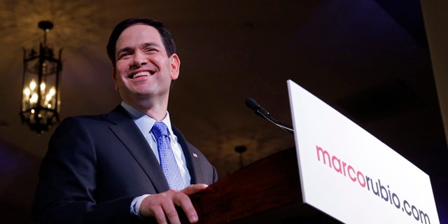 Florida Sen. Marco Rubio smiles during his announcement he is running for the Republican nomination, at a rally at the Freedom Tower, Monday, April 13, 2015, in Miami. (AP Photo/Alan Diaz)