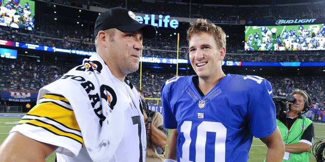 Pittsburgh Steelers quarterback Ben Roethlisberger (7) and New York Giants quarterback Eli Manning (10) talk after the Giants beat the Steelers 20-16 in a preseason NFL football game, Sunday, Aug. 10, 2014, in East Rutherford, N.J. (AP Photo/Bill Kostroun)