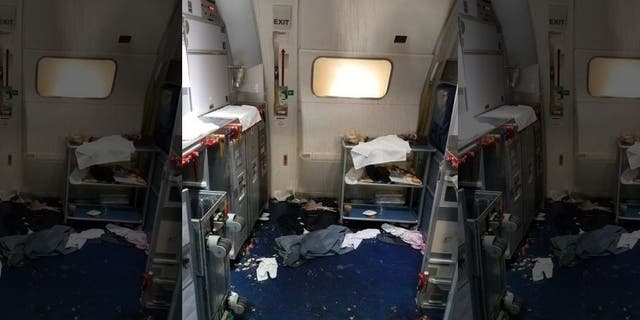 This photo taken the FBI and released via the U.S. Attorney's Office in Seattle shows the aftermath of a cabin on Delta Flight 129 from Seattle to Beijing.